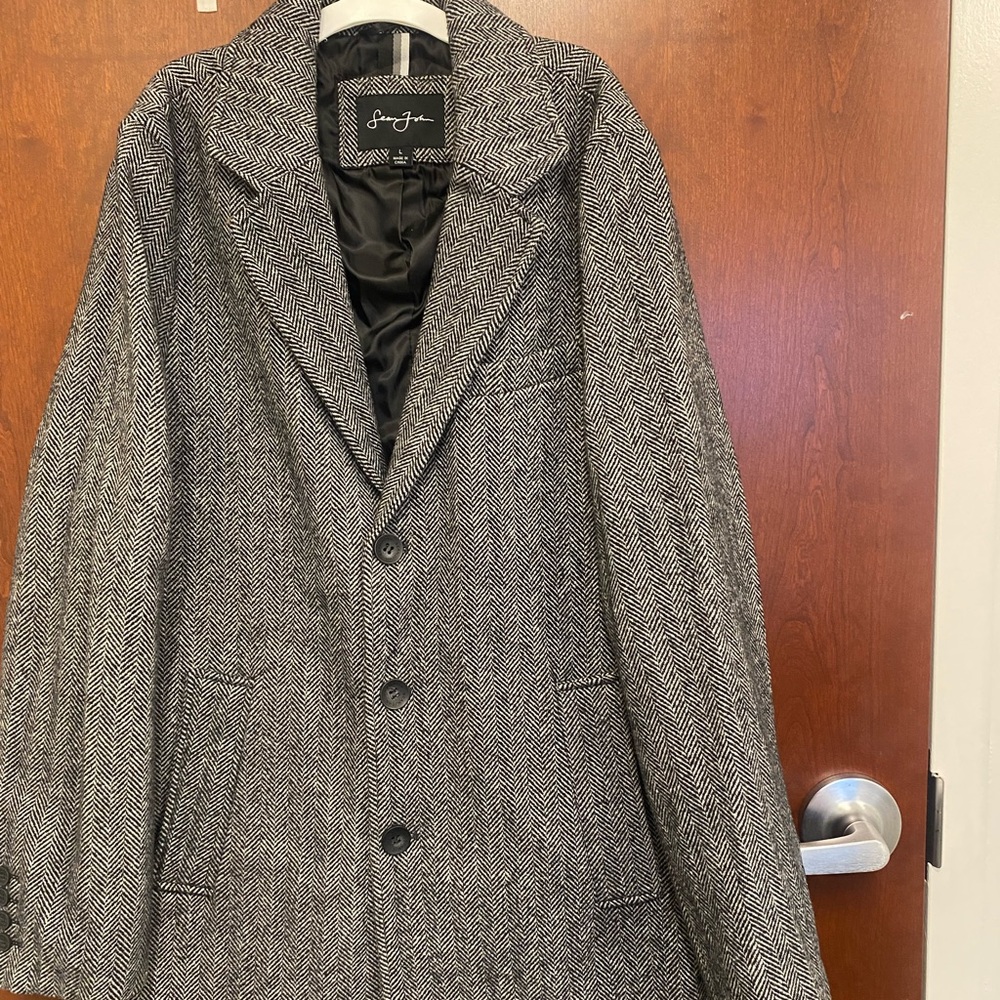 Mens sophisticated single breasted Herringbone  coat. Can be dresses up or down.